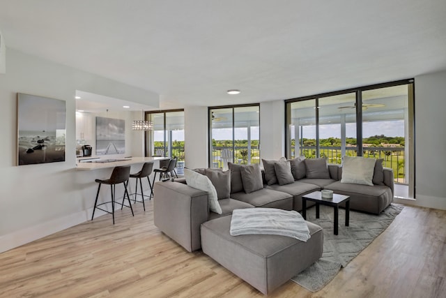 5279 Fountains Dr S Unit 602, Lake Worth, FL 33467 - living room with light wood-type flooring and baseboards