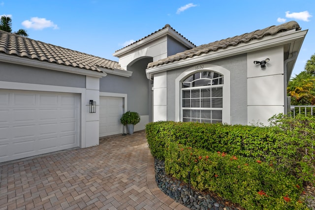 exterior space with a garage