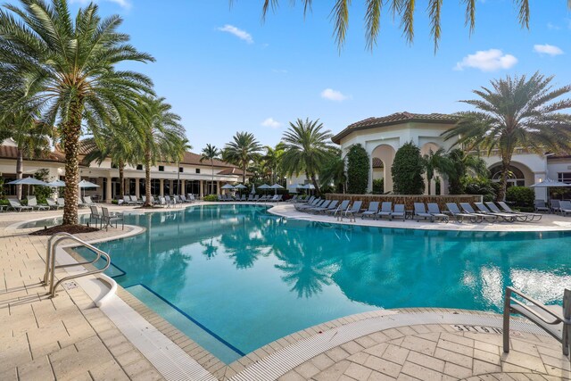 view of swimming pool featuring a patio