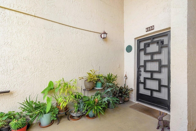 6055 Parkwalk Dr, Boynton Beach, FL 33472 - property entrance featuring stucco siding