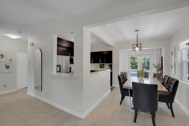 tiled dining area with french doors