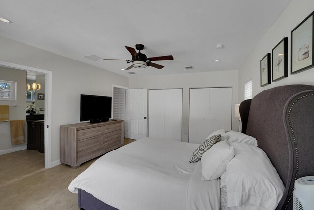 1305 NE 1st Ave, Fort Lauderdale, FL 33304 - bedroom with multiple closets, recessed lighting, connected bathroom, a ceiling fan, and baseboards