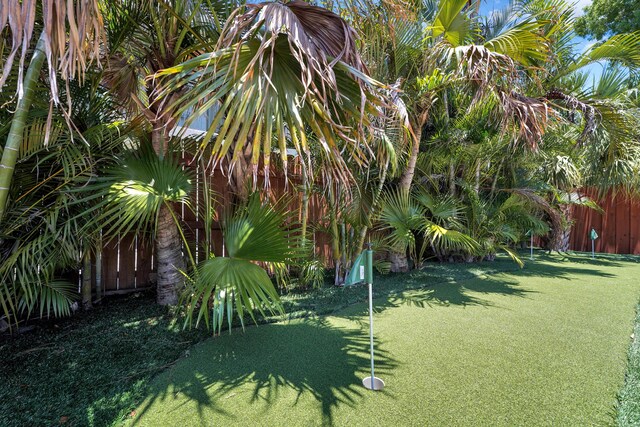 1305 NE 1st Ave, Fort Lauderdale, FL 33304 - back of property with a tiled roof and stucco siding