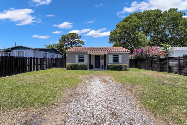 view of front of house with a front lawn