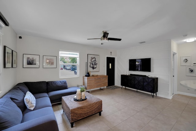 living room featuring ceiling fan