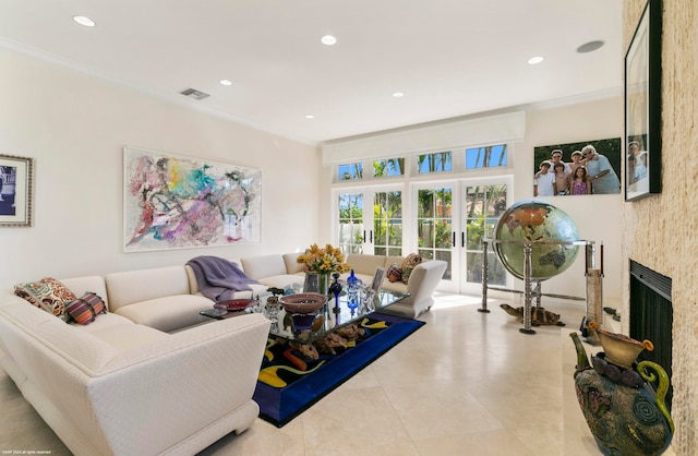 living room featuring crown molding and tile patterned flooring