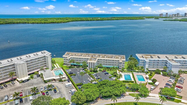 birds eye view of property featuring a water view