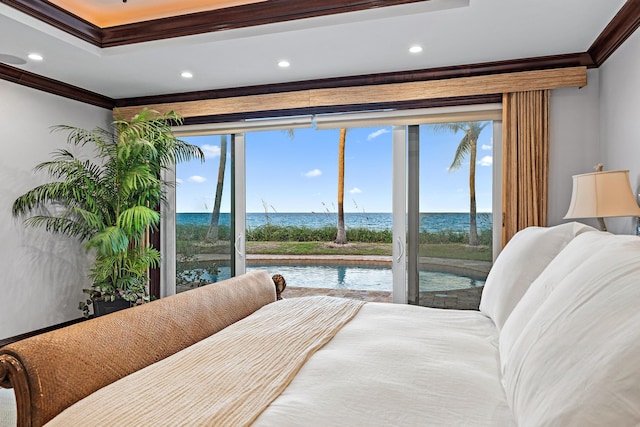 bedroom featuring ornamental molding, access to outside, and a water view