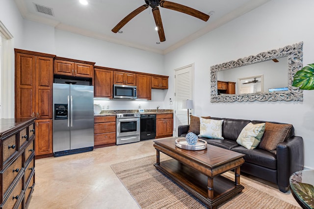 kitchen featuring a high ceiling, stainless steel appliances, ornamental molding, ceiling fan, and sink