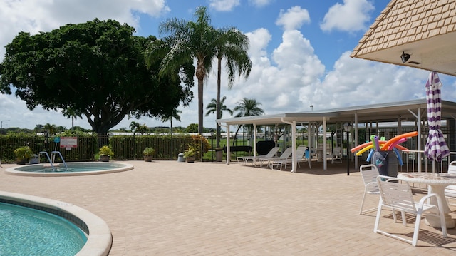 view of swimming pool with cooling unit