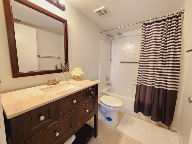 full bathroom featuring vanity, toilet, tile patterned flooring, and shower / bathtub combination with curtain