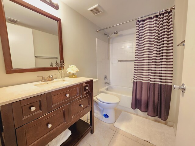 full bathroom featuring vanity, toilet, tile patterned floors, and shower / bathtub combination with curtain