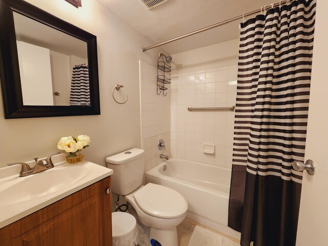 full bathroom featuring vanity, toilet, shower / bath combination with curtain, and tile patterned floors