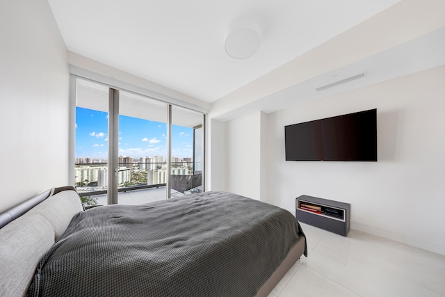 tiled bedroom with access to outside