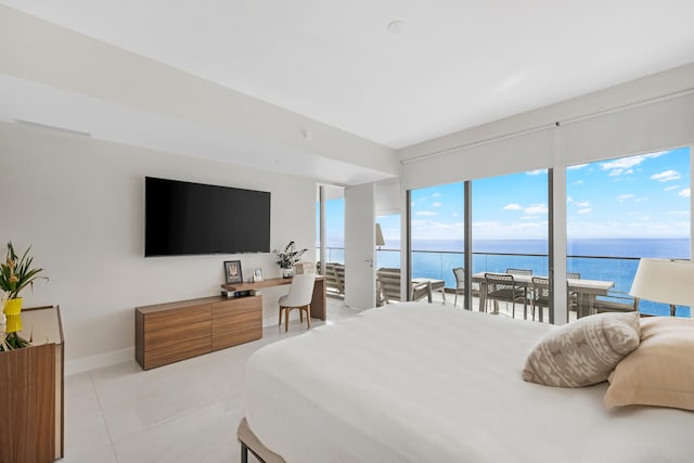 tiled bedroom featuring access to exterior