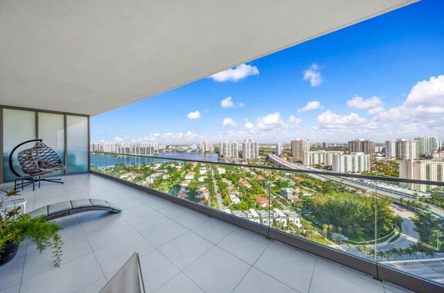 balcony featuring a water view