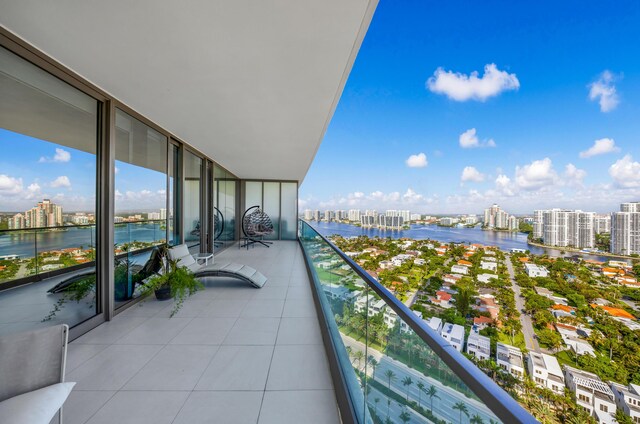 balcony featuring a water view