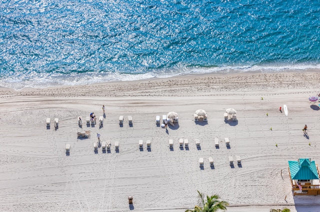 aerial view with a view of the beach and a water view