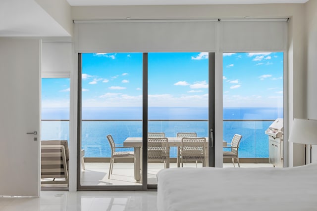 unfurnished bedroom with a water view