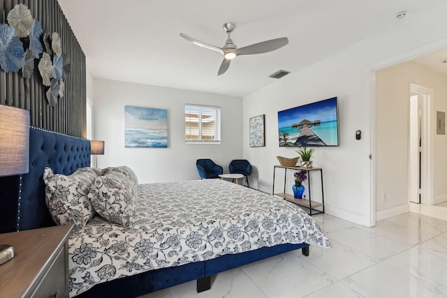 bedroom featuring visible vents, marble finish floor, baseboards, and ceiling fan