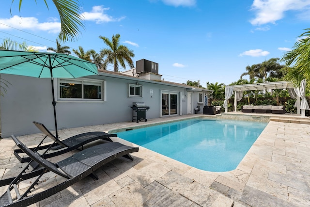 outdoor pool featuring grilling area, central AC, outdoor lounge area, a pergola, and a patio