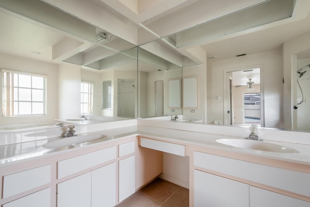 bathroom featuring vanity, walk in shower, ceiling fan, and tile patterned floors