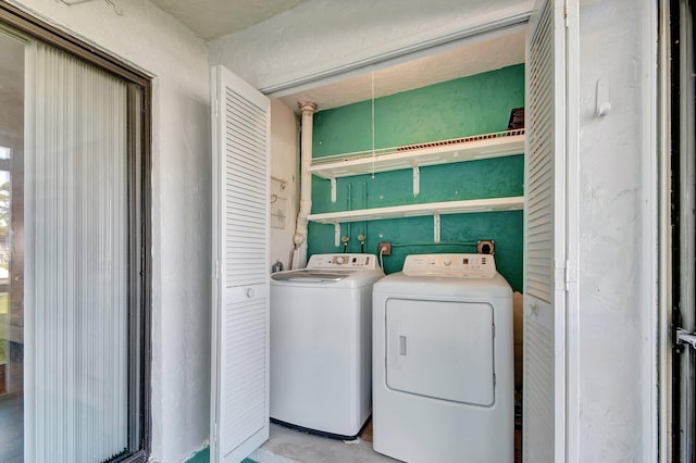 washroom featuring separate washer and dryer