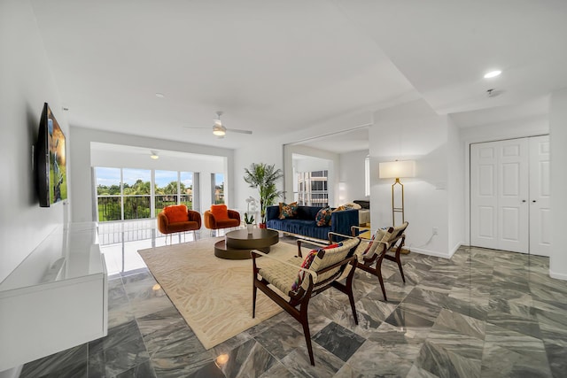 living room with ceiling fan