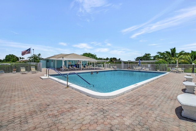 view of pool featuring a patio area