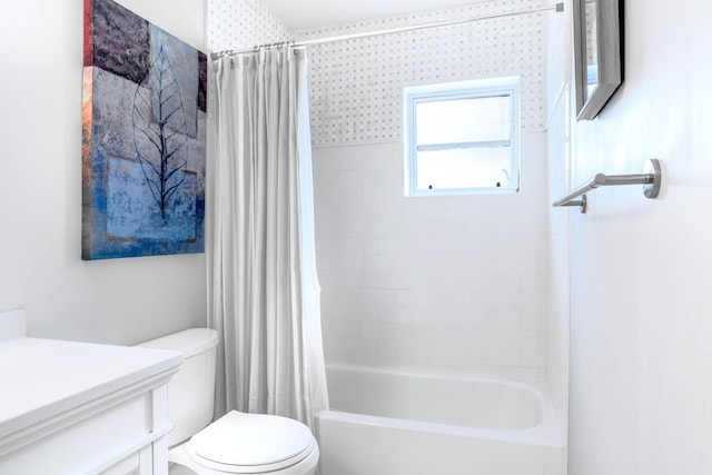 full bathroom featuring shower / tub combo, vanity, and toilet