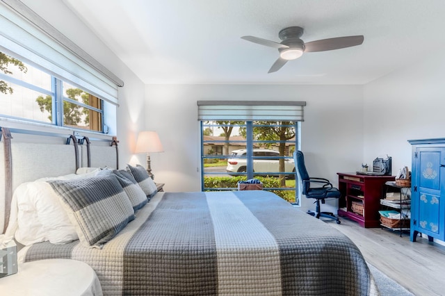 bedroom featuring ceiling fan and light wood-type flooring