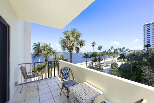 balcony featuring a water view