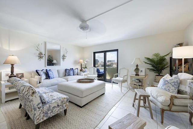 tiled living room with ceiling fan