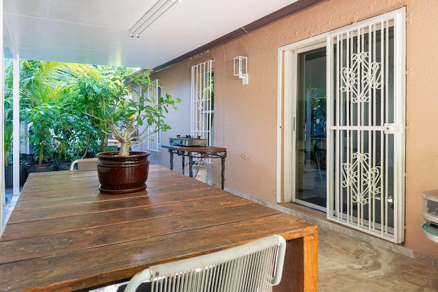 exterior space featuring crown molding