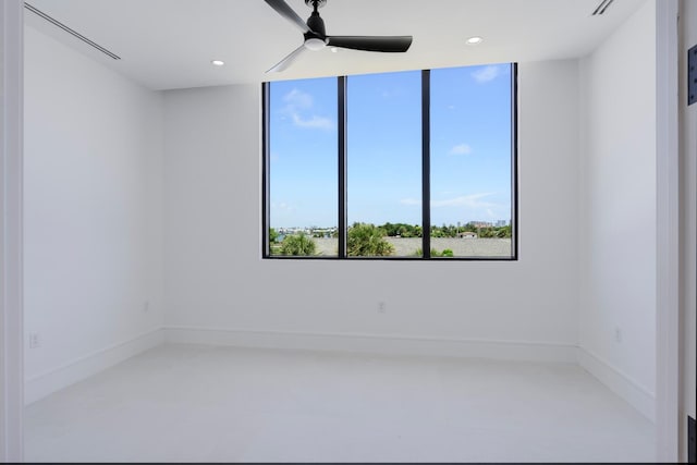 spare room featuring ceiling fan