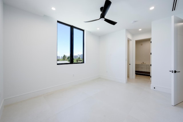 unfurnished bedroom featuring ceiling fan