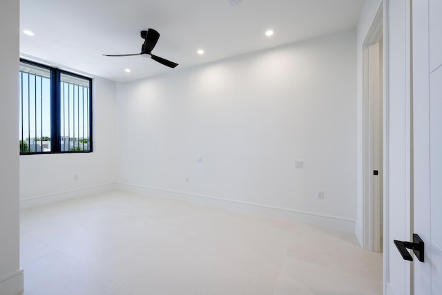 unfurnished room featuring ceiling fan