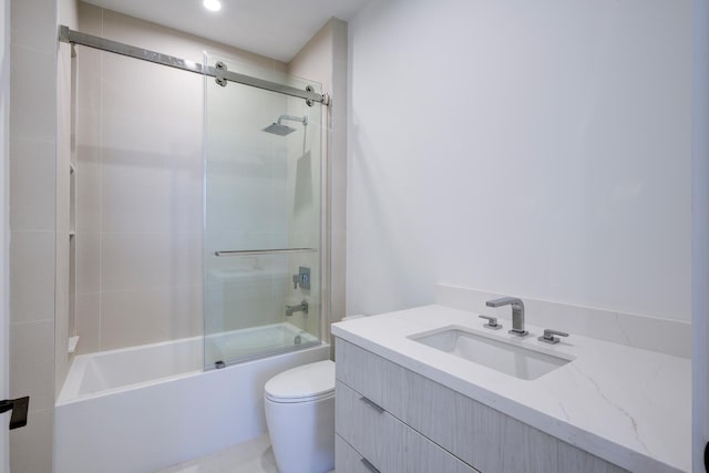 full bathroom with toilet, enclosed tub / shower combo, and vanity