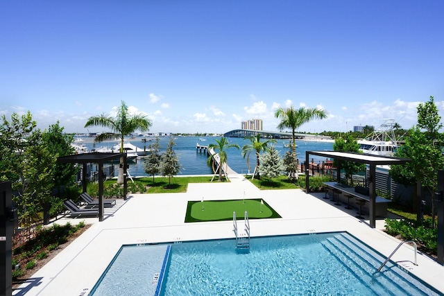 view of pool featuring a water view, a gazebo, and a patio