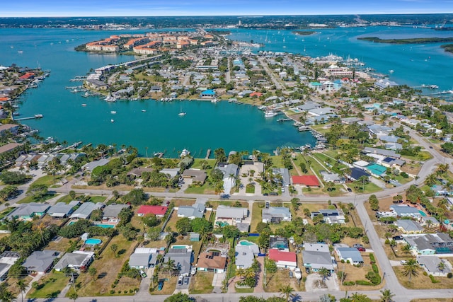 drone / aerial view with a water view