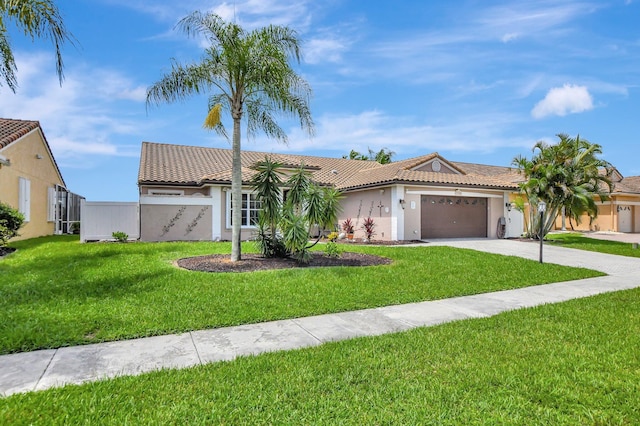 view of front facade featuring a garage and a front yard