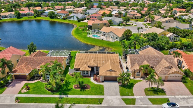 bird's eye view with a water view