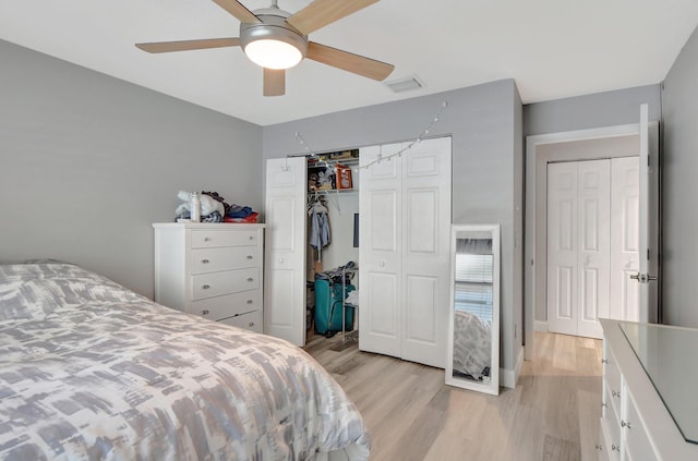 bedroom with ceiling fan and light wood-type flooring