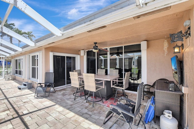 view of patio / terrace featuring ceiling fan