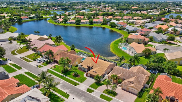 drone / aerial view featuring a water view