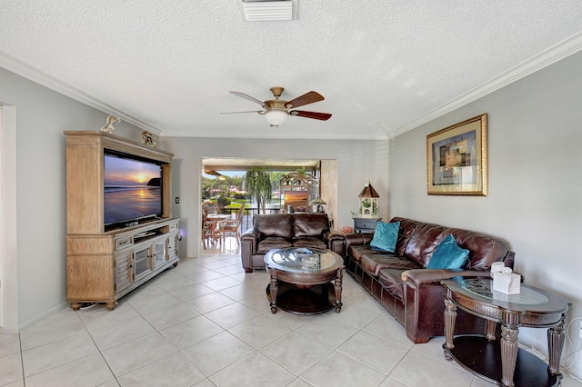 tiled living room featuring a textured ceiling, ceiling fan, and ornamental molding