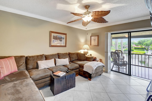 tiled living room featuring ceiling fan, a textured ceiling, and ornamental molding