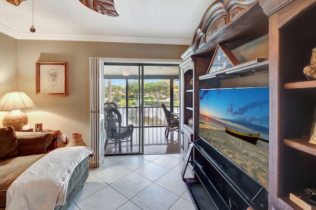 bedroom with access to exterior, a textured ceiling, light tile patterned floors, and ornamental molding