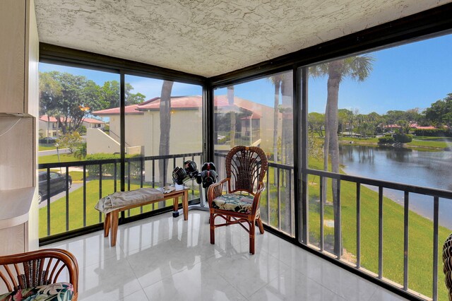 sunroom with a water view