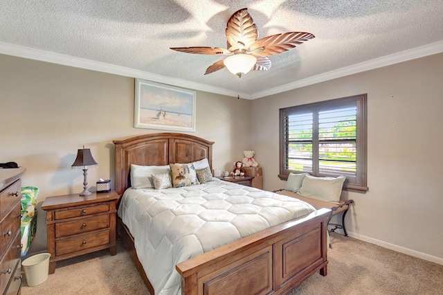 bedroom featuring ceiling fan, light colored carpet, a textured ceiling, and crown molding